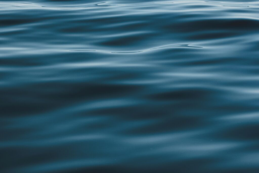 Calm water representing the process of healing attachment wounds in therapy