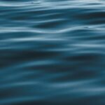 Calm water representing the process of healing attachment wounds in therapy